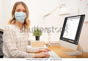 young-business-woman-working-home-600w-1670028376